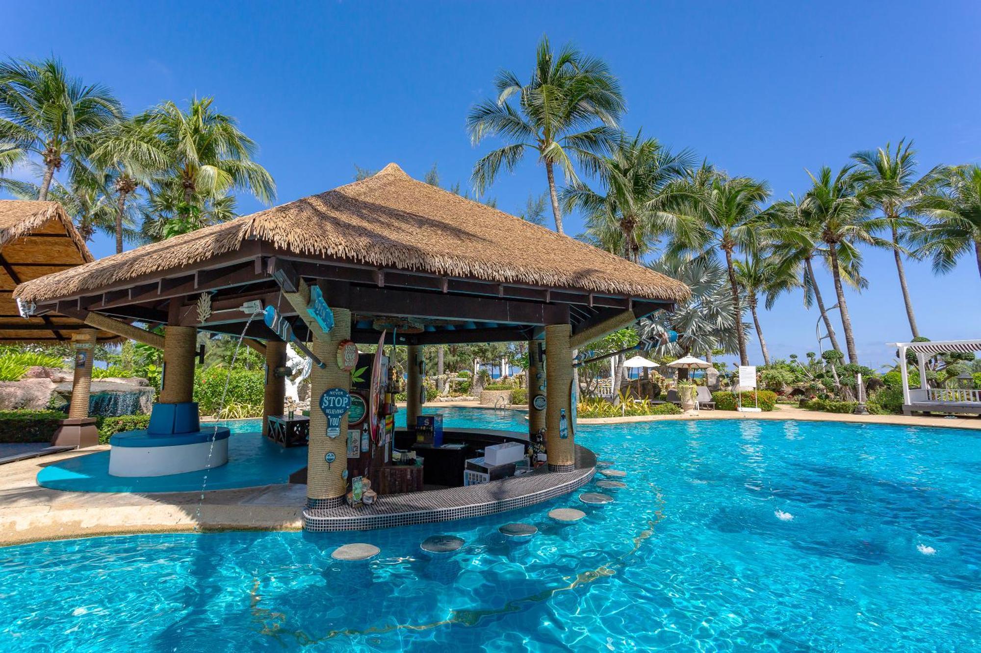 Thavorn Palm Beach Resort Phuket Karon Esterno foto Pool bar at a resort in Nha Trang, Vietnam